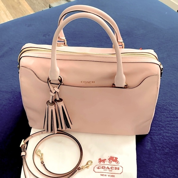 Coach Handbags - COACH Pink Leather Barrel Bag
Excellent Condition, barely used.